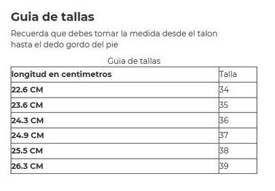 Botas planas para mujer en carnaza