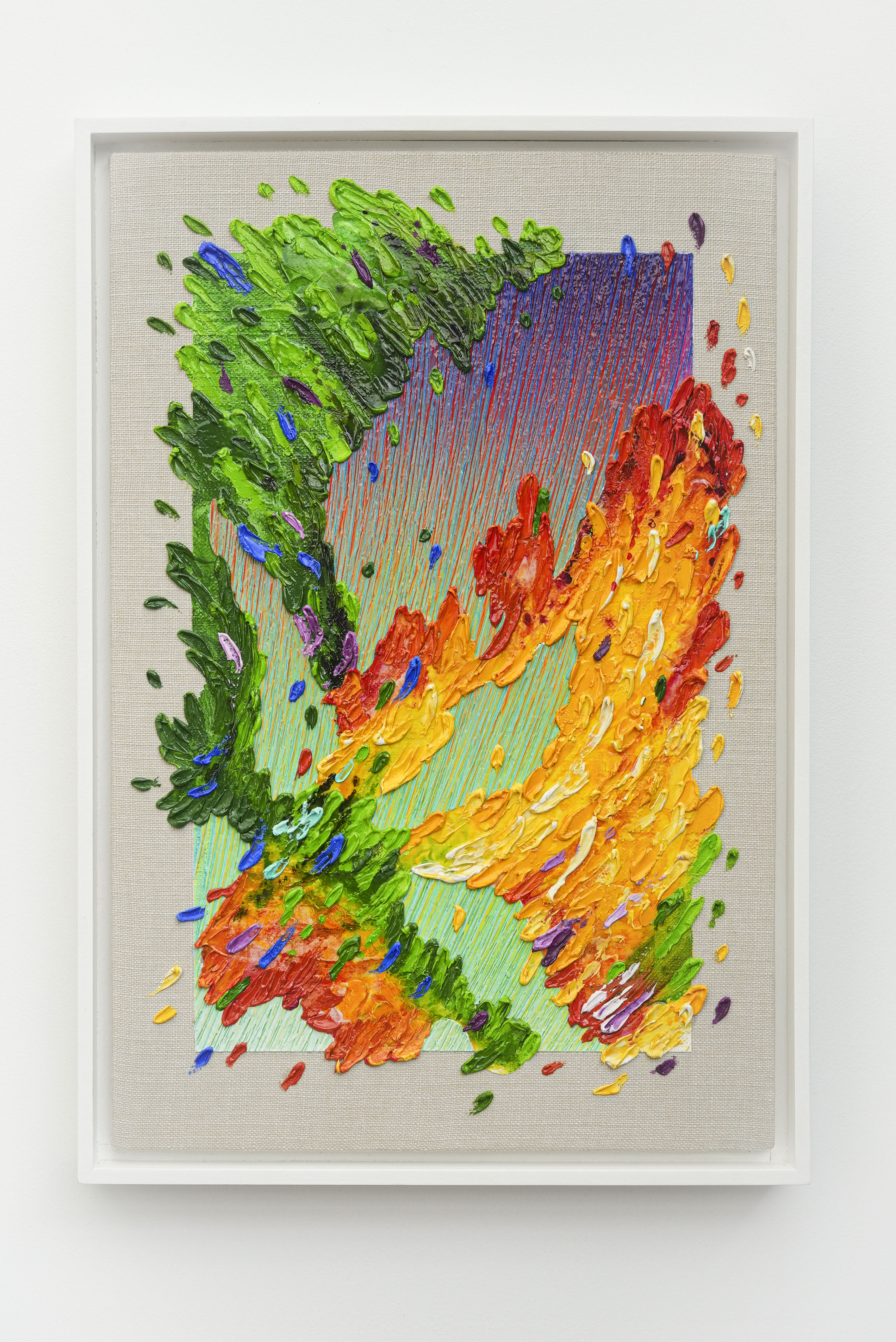 Mesa de trabajo de Guido Llordi con pinturas fluidas y herramientas