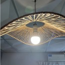 Foto del comprador: l&aacute;mpara Positivo encendida bajo una pantalla de mimbre