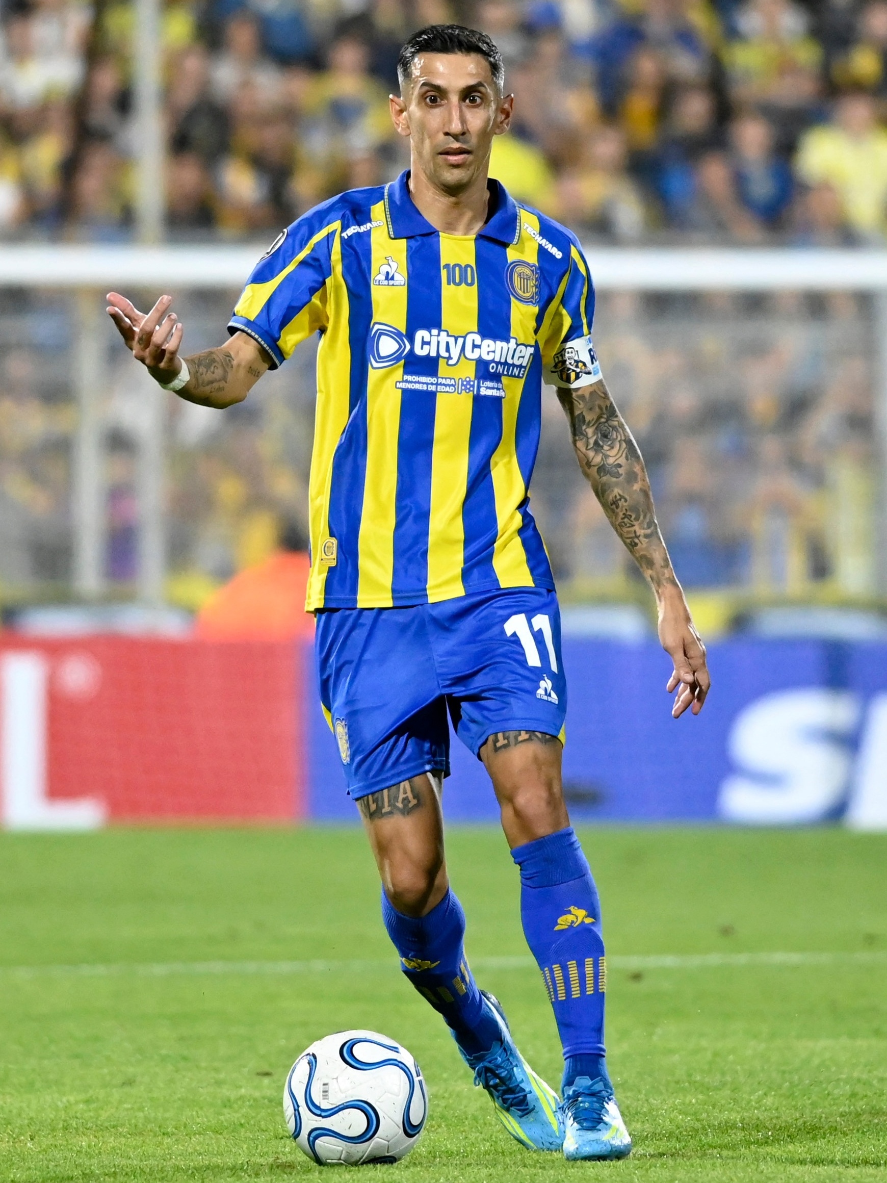 camisa-retro-rosario-central-100-anos-2026-centenario-amarela-azul-listrada-titular-di-maria-Centenario-segovia-