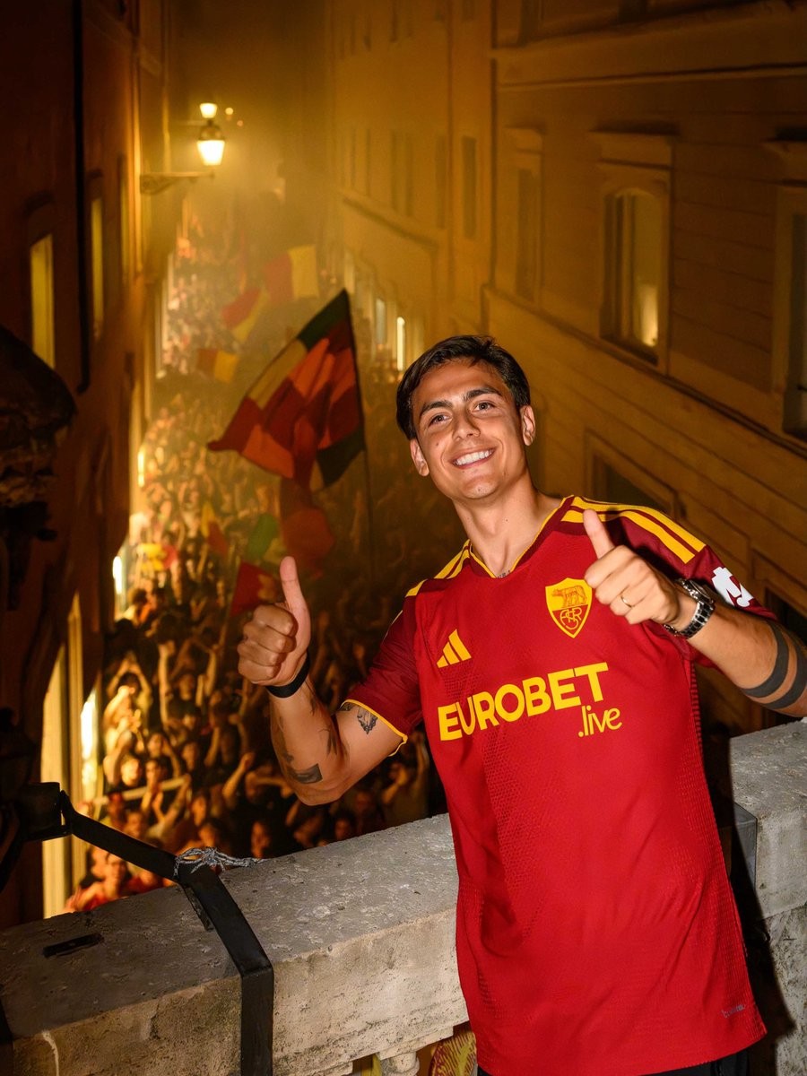 camisa-roma-26-27-home-2026-2027-vinho-grena-vermelha-laranja-modelo-torcedor-dybala-wesley-malen-