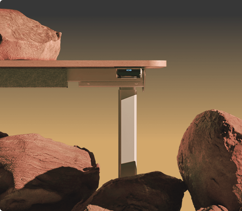 Ângulo fechado lateral da estrutura da mesa F50 ambientada em ensaio fotográfico com pedras, transmitindo robustez, resistência, firmeza e durabilidade