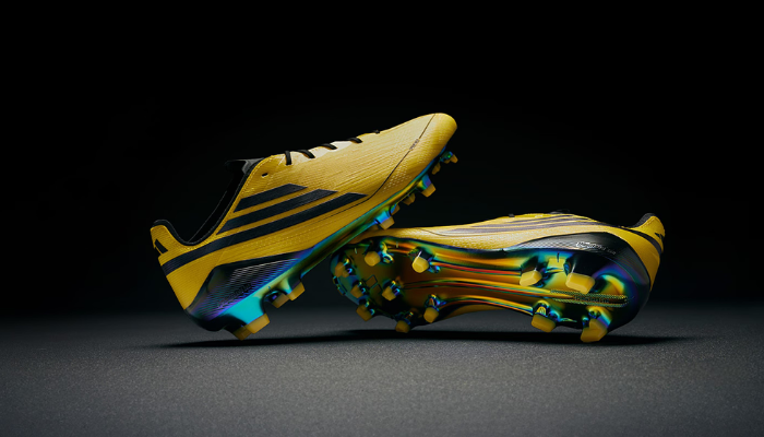 Chuteira Adidas F50 Adizero Elite FG 2010 amarela e preta, edição limitada com design retrô, sola Sprintframe 360 e cabedal Fibertouch