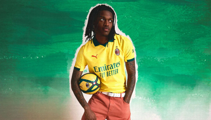 Terceira camisa Milan Puma 2025/26 amarela com gola verde e monograma ACM em padrão