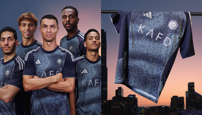 Camisa reserva Al-Nassr Adidas 2025/26 versão torcedor, azul-marinho com gráfico turquesa e detalhes prateados inspirados no céu noturno de Riade.
