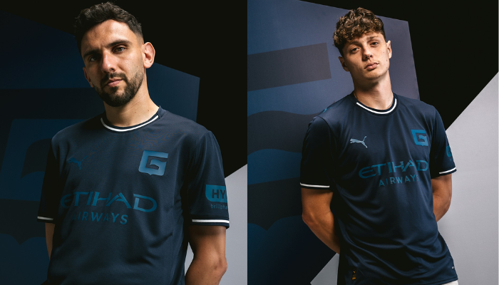 Terceira camisa do Girona 2025/26 Puma azul marinho com gola branca e escudo substituído por “G” estilizado.