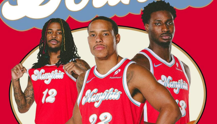 Camisa Regata Memphis Grizzlies City Edition 2024-25 Nike, cor vermelha, com painel lateral “cortado e costurado” e detalhes em azul e dourado, celebrando os Memphis Sounds de 1974.