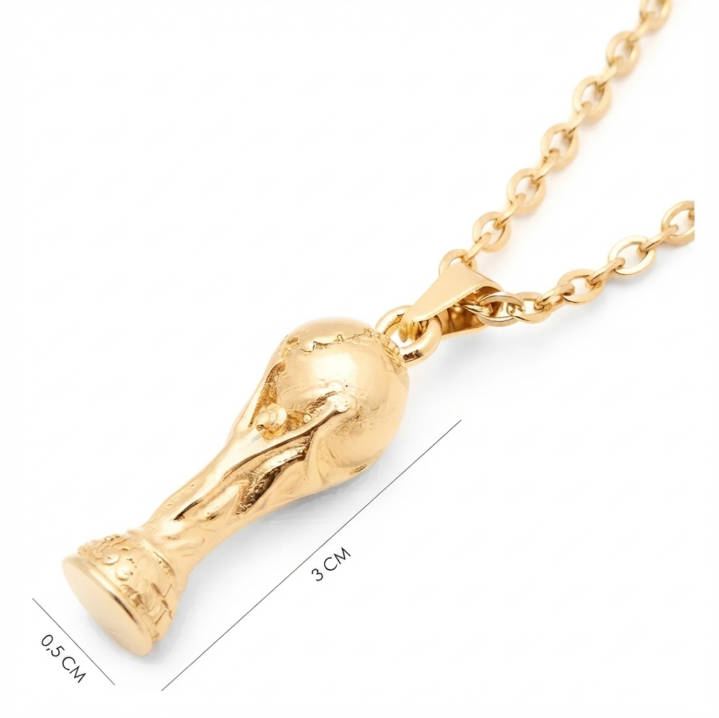 Detalle del dije trofeo dorado