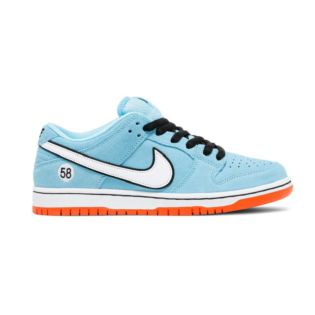 Tênis Nike Dunk Low "Club 58 Gulf" na cor azul com detalhes em laranja e logotipo da Nike, disponível na Supernova Sneakers.