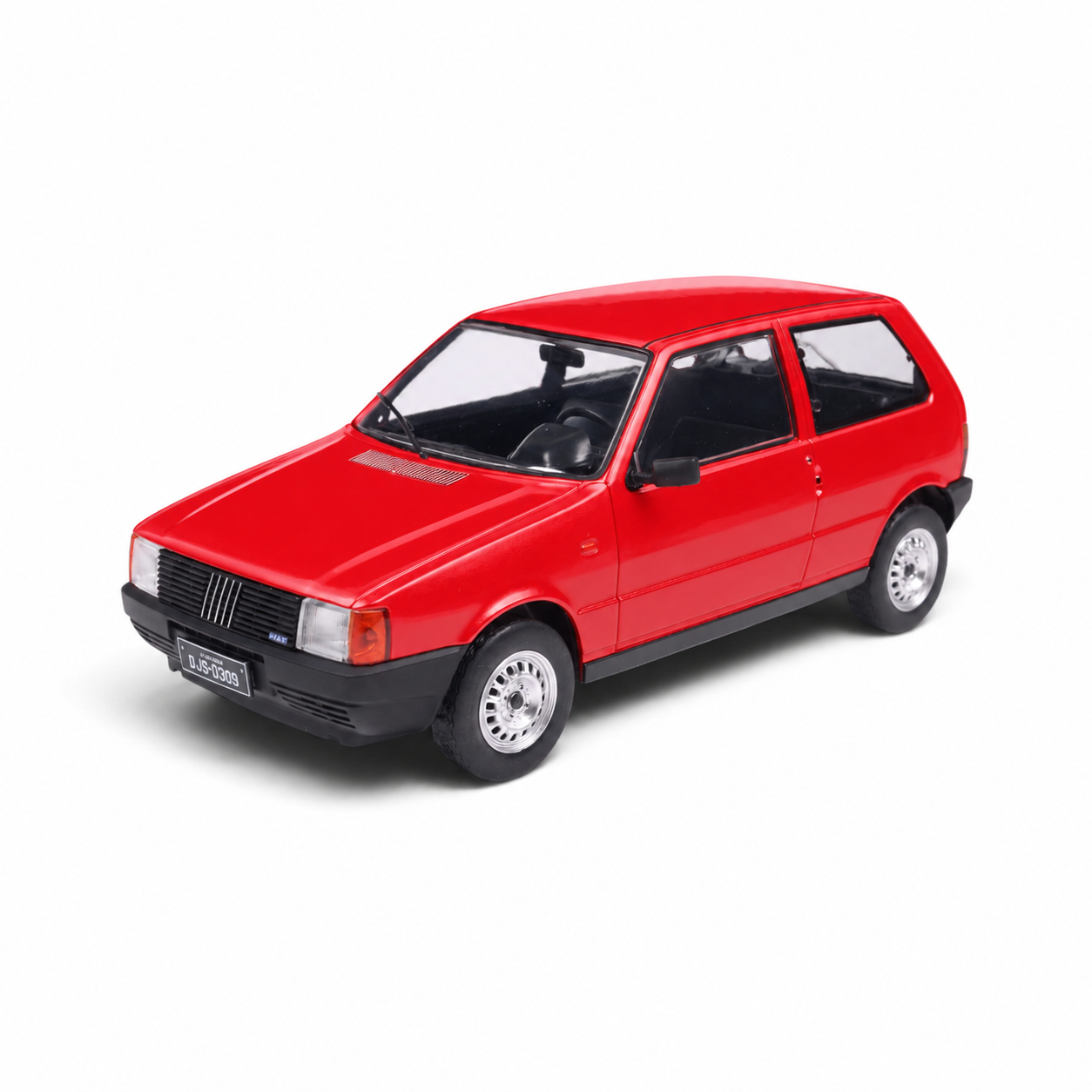 Vista dianteira da miniatura Fiat Uno S 1985 vermelha, California Toys, escala 1:24, c&oacute;digo CAL24233B