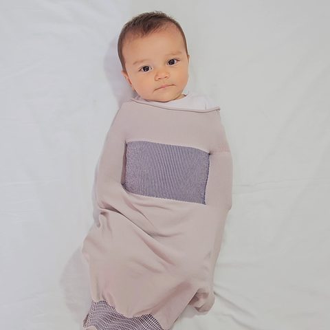 Bebê vestido com o Pupa, pronto para dormir