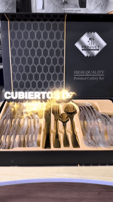 Set de cubiertos dorados en uso