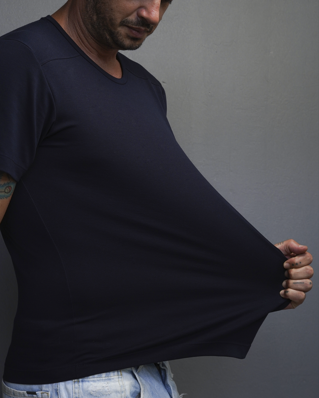 Detalhe da costura da camiseta Rumo 5