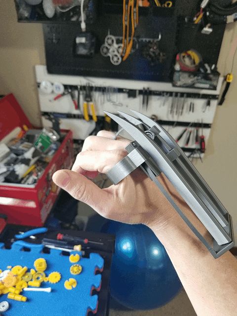 Garras de Wolverine - retráctiles, con resorte, de gatillo