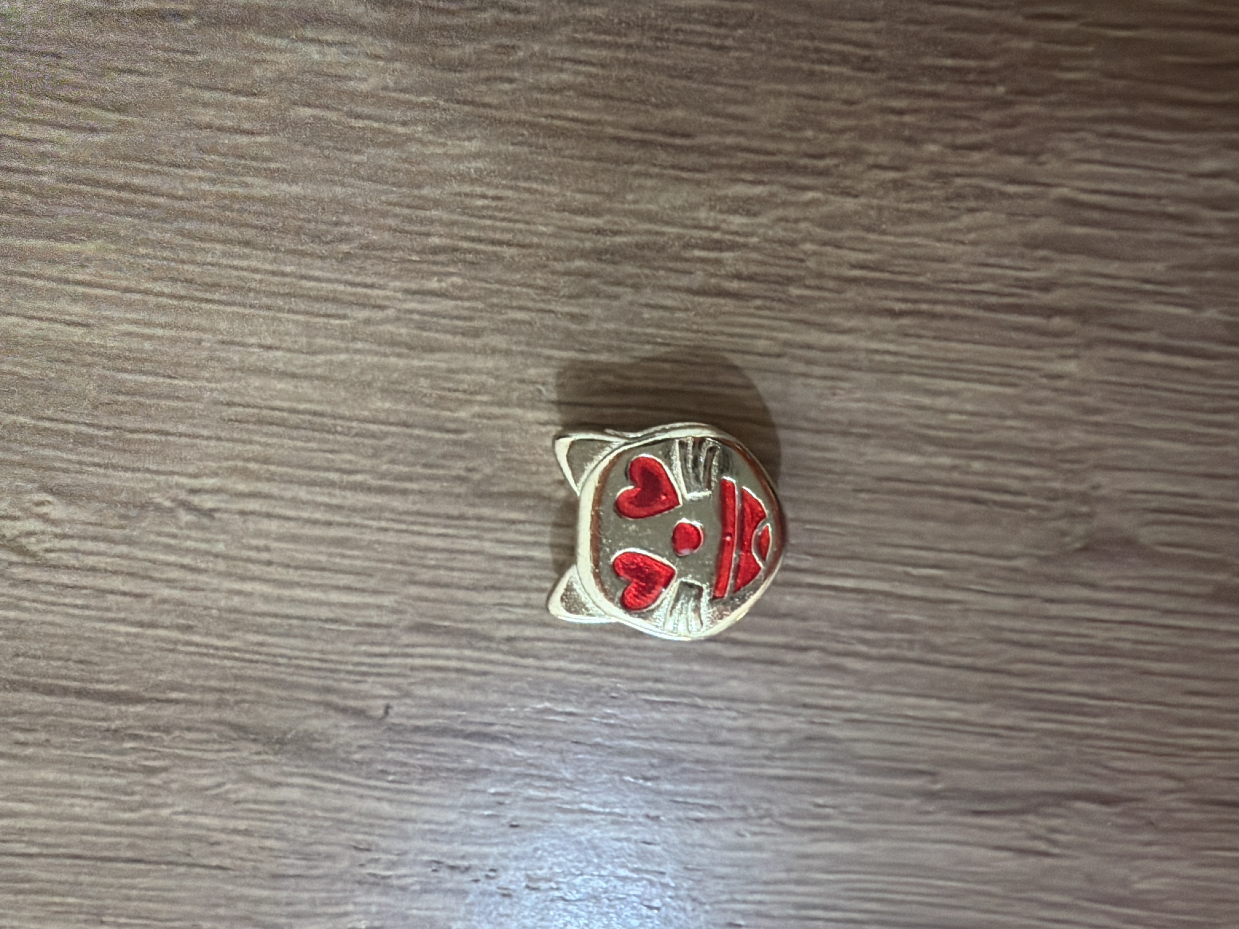 Gatinho vermelho — passador para alça 10