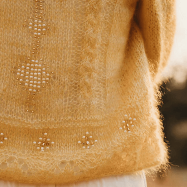 Bead application in knitted fabric by Pope Vergara